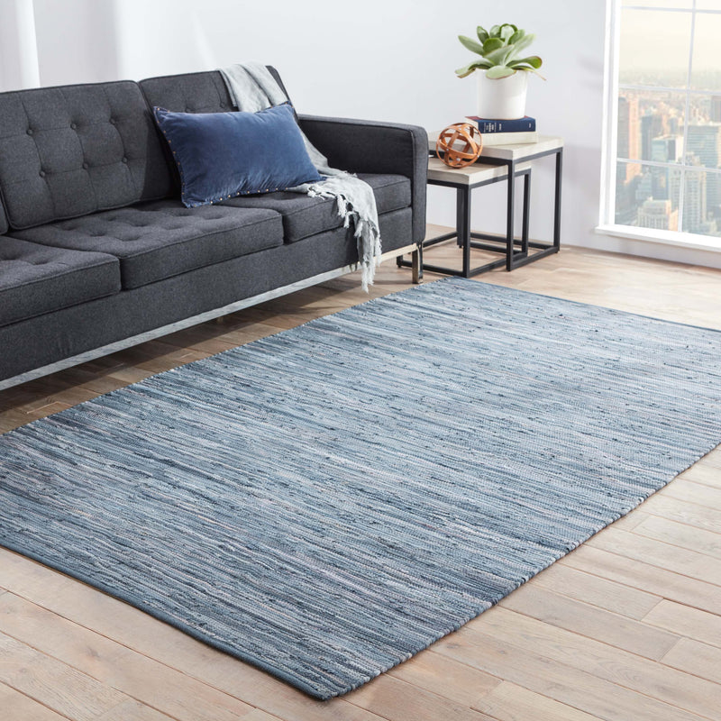 Raggedy Handmade Solid Blue Area Rug