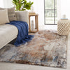 Comet Abstract Rug in Brown & Blue by Jaipur Living