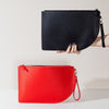 Curve Clutch in Various Colors