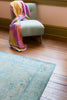 Alessia Border Rug in Pelican & Aquatic design by Jaipur Living