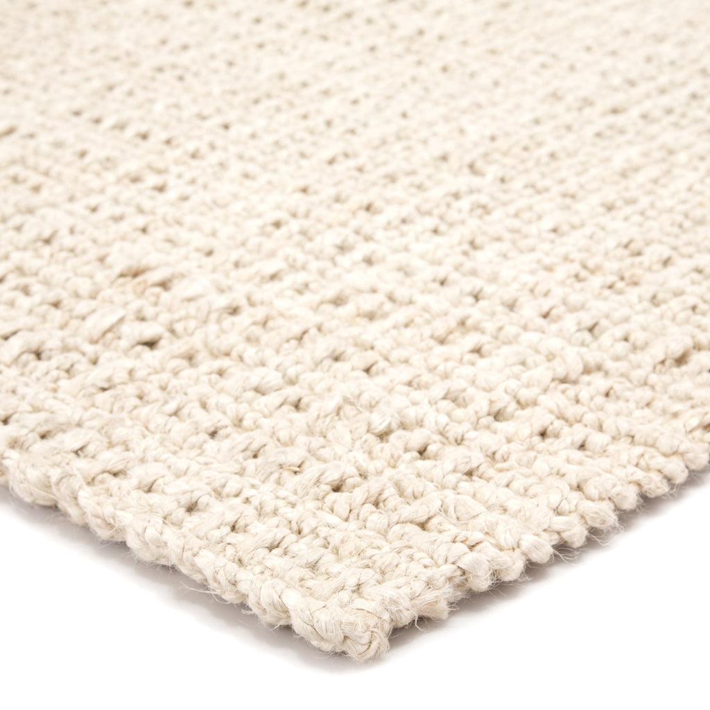 Tyne Natural Solid Ivory Area Rug