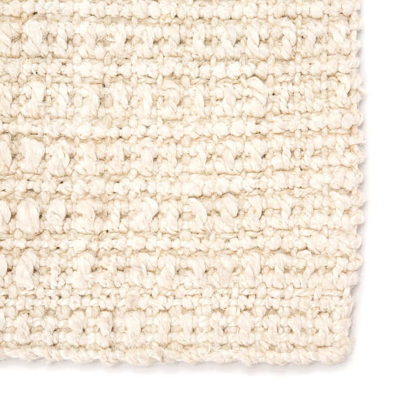 Tyne Natural Solid Ivory Area Rug